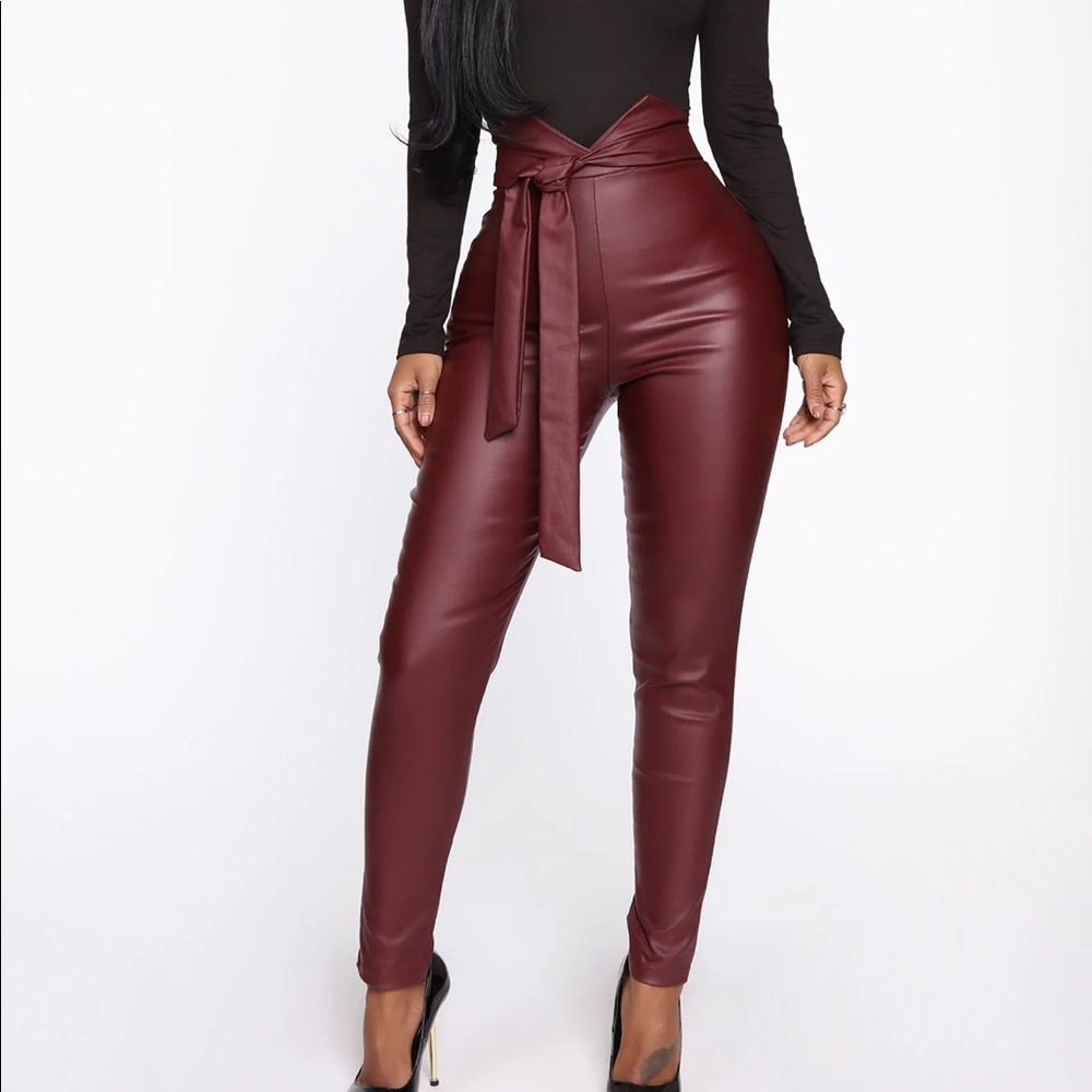 Burgundy high waisted tie faux leather pants